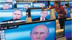  ?? ALEXANDER NEMENOV/ AFP/ GETTY IMAGES/ FILES ?? Estonia, Latvia and Lithuania are moving to curtail the influence of Russian television on the million Russian speakers who live in the Baltic nations.
