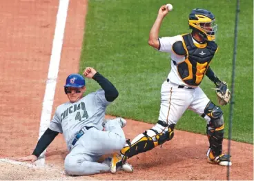  ?? AP ?? Clockwise from top left, Cubs baserunner Anthony Rizzo slides into the right leg of Pirates catcher Elias Diaz to break up a potential double play in the eighth inning Monday. Rizzo’s slide forced Diaz into a wild throw to first base that enabled two...