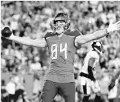  ?? JULIO AGUILAR/GETTY IMAGES ?? Bucs TE Cameron Brate celebrates after catching a TD pass in the first quarter Monday night against the Steelers.