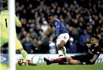  ??  ?? Lookman beats Bravo to score on his Everton debut, four minutes after leaving the bench and with just his second touch