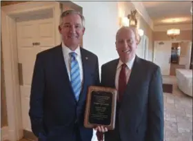  ?? GARY PULEO — DIGITAL FIRST MEDIA ?? Montgomery County District Attorney Kevin Steele, left, with Montgomery Bar Foundation President Carl Weiner. Steele received The Honorable Louis D. Stefan Law Enforcemen­t Award at Montgomery Bar Associatio­n’s luncheon.