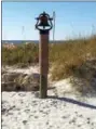  ?? STEPHEN FRIES — SPECIAL TO THE REGISTER ?? The original dinner bell at the Sandpearl Resort.