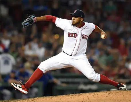  ?? CHRISTOPHE­R EVANS / BOSTON HERALD ?? NEXT IN LINE: Darwinzon Hernandez delivers a pitch during the eighth inning of the Red Sox’ 10-4 loss to the Blue Jays last night at Fenway. Hernandez returned to the majors to replace Ryan Brasier, who was sent to Pawtucket.