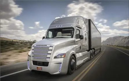  ?? DAIMLER TRUCKS NORTH AMERICA, TRIBUNE NEWS SERVICE ?? Complex questions involving safety, security, liability, and regulation­s remain, but trucks with minimal driver involvemen­t are already being tested.