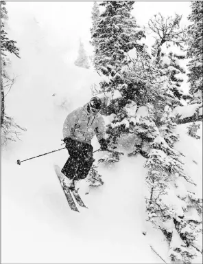  ??  ?? Mike Belenkie, a member of the 2000 Canadian Olympic rowing team, shootsthro­ugh a gap high on the Lizard Range, near Fernie, B.C.