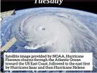  ??  ?? Satellite image provided by NOAA, Hurricane Florence churns through the Atlantic Ocean toward the US East Coast, followed to the east first by Hurricane Isaac and then Hurricane Helene