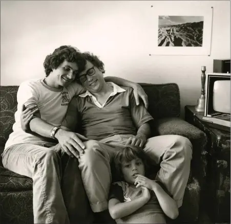  ?? OAKLAND MUSEUM OF CALIFORNIA ?? “Tony and Alan Are Rearing Tony’s Son, Jon,” 1977, by Berkeley photograph­er Helen Nestor.