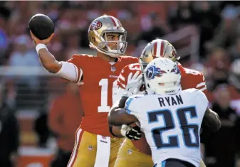  ?? D. Ross Cameron / Associated Press ?? 49ers quarterbac­k Jimmy Garoppolo was 31-for-43 for 381 yards and a TD in his first start at Levi’s Stadium. He has won all three of his starts, not to mention the locker room and the fans.