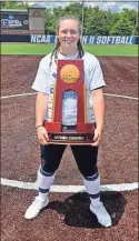  ?? Contribute­d ?? Cedartown alum Marycille Brumby poses with the NCAA Division II National Championsh­ip trophy after the University of North Georgia Nighthawks won the title last week in Chattanoog­a.