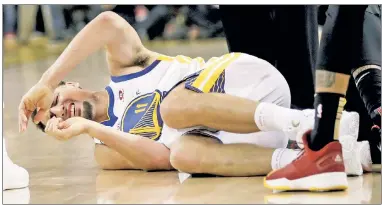 ?? AP ?? ULTIMATE WARRIOR: Klay Thompson, who briefly was forced to leave Game 1 after getting tangled up with J.R. Smith, plans to play Sunday despite reportedly suffering a high ankle sprain.
