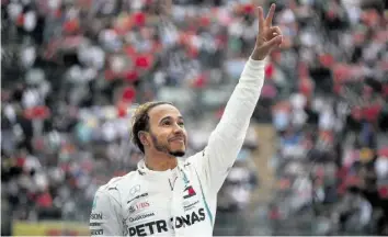  ?? AP ?? Lewis Hamilton sicherte sich zwar den GP-Sieg in Mexiko nicht, dafür aber seinen fünften WM-Titel.