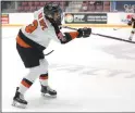  ?? PHOTO COURTESY MEDICINE HAT TIGERS/ RANDY FEERE ?? Eric Van Impe passes the puck in this undated photo.