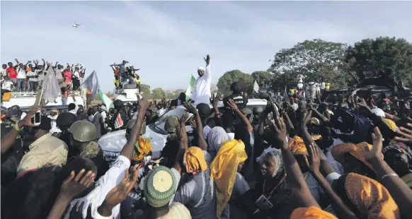  ?? Reuters ?? Gambia’s president, Adama Barrow, above, has made genuine commitment­s to human rights and governance but people’s livelihood­s haven’t improved