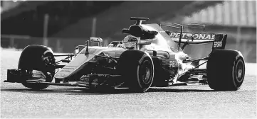  ?? — AFP photo ?? Mercedes’ British driver Lewis Hamilton drives at the Circuit de Catalunya in Montmelo, on the outskirts of Barcelona during the third day of the first week of tests for the Formula One Grand Prix season.