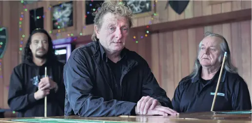  ?? PHOTOS: PETER MCINTOSH ?? Nowhere to go . . . Heffs Hotel publican Stephen Clark (centre) says many of his regulars like Dean Roma (left) and Sam Smith will be left with nowhere in South Dunedin to socialise when he is forced to close the bar at the end of the month.