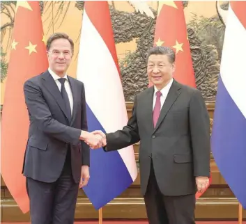  ?? — Reuters ?? Chinese President Xi Jinping meets PM of the Netherland­s Mark Rutte at the Great Hall of the People in Beijing.