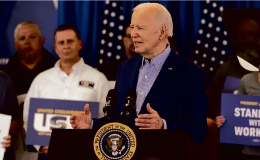  ?? JEFF SWENSEN/GETTY IMAGES ?? President Biden spoke to members of the United Steel Workers Union at the union headquarte­rs on Wednesday in Pittsburgh.