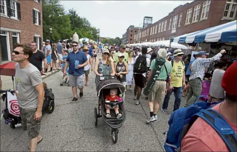  ?? JULIA MALAKIE / LOWELL SUN ?? French street was packed in July 2019 for the Lowell Folk Festival.