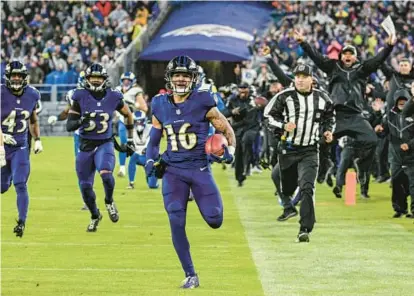  ?? JERRY JACKSON/STAFF ?? For Ravens wide receiver Tylan Wallace, his dramatic 76-yard game-winning punt return for a touchdown against the Rams last Sunday was as much a dream for him as it was for his identical twin brother, Tracin, whose own NFL hopes were dashed.