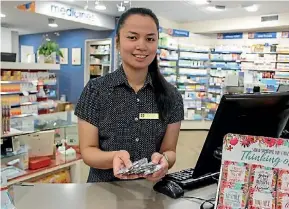  ?? DENISE PIPER/STUFF ?? Intern pharmacist Ma Celina Cura says Northcross Pharmacy accepts all sorts of unwanted medicines through the DUMP initiative.