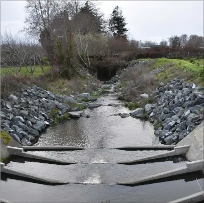  ?? MARY BULLWINKEL — FOR THE TIMES-STANDARD ?? This habitat improvemen­t project on Rohner Creek in Fortuna, where the creek flows under 12th Street, has provided salmon with access to higher reaches of the stream.