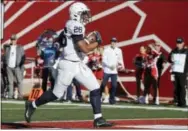  ?? DARRON CUMMINGS — THE ASSOCIATED PRESS ?? Penn State running back Saquon Barkley goes in for a fouryard touchdown run during the second half against Indiana on Saturday.