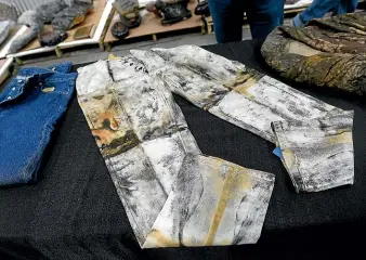  ?? AP ?? A pair of work pants, possibly made by or for Levi Strauss, have sold for $178,000 after being retrieved from a shipwreck off the coast of North Carolina.
