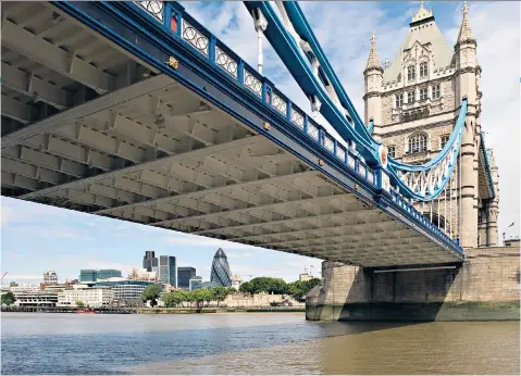  ??  ?? Passing under Tower Bridge, above, made for an impressive start to Paul Miles’s cruise on the wide-beam narrowboat Kailani, bottom left