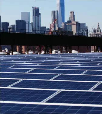  ?? AP FILE PHOTOS ?? LOSING ITS SHINE: A U.S. trade group has found that cheap imports have hurt profits in the American solar business. But at least four states oppose slapping tariffs on imports, saying that would cause installati­ons to drop by as much as 50 percent.