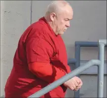  ?? Special to The Daily Courier ?? Loren Reagan enters the Penticton courthouse in March.