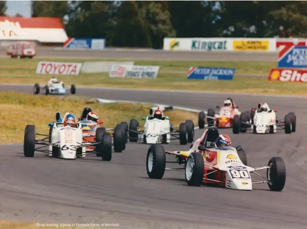  ??  ?? Greg leading a pack of Formula Fords at Manfeild