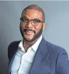  ?? AMY SUSSMAN/INVISION/AP ?? Tyler Perry is not giving out free scholarshi­ps via Facebook. It’s another scam during back-to-school season.