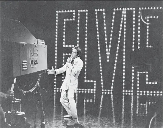  ?? ©ABG EPE IP LLC ?? ELVIS PRESLEY had to shake off his early insecuriti­es and defy his manager, Col. Tom Parker, before taking the stage for his 1968 television special on NBC.