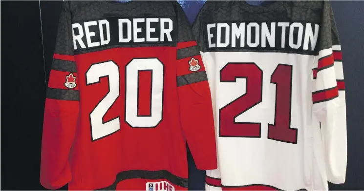  ?? DAVID BLOOM ?? Team Canada jerseys hang at Rogers Place for Thursday’s announceme­nt that Red Deer and Edmonton will co-host the 2021 world juniors.