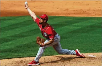  ?? ASSOCIATED PRESS ?? Michael Lorenzen likely has a spot waiting for him in the Reds’ rotation when he fully recovers from a shoulder injury believed to be minor. “I don’t foresee me really missing any time,” he says.