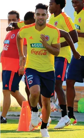  ??  ?? A fit and fresh Radamel Falcao goes through his paces during Colombia’s training session ahead of their clash against England tomorrow