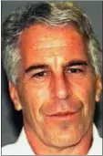  ?? PALM BEACH SHERIFF’S OFFICE — AP FILE ?? This arrest file photo made available by the Palm Beach, Fla., Sheriff’s Office shows Jeffrey Epstein. Epstein, a wealthy financier and convicted sex offender, has been arrested in New York on sex traffickin­g charges. Two law enforcemen­t officials said Epstein was taken into federal custody Saturday on charges involving sex-traffickin­g allegation­s that date to the 2000s.