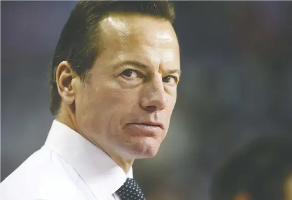  ?? JIM WELLS/FILES ?? “We’re like little kids when there is an overtime goal, and it doesn’t matter if you’re a player or a coach or anyone on the staff,” Flames assistant coach Martin Gelinas says.
