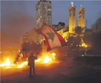  ?? AFP ?? Protesters began a ‘week of anger’ on Tuesday as Lebanon’s economic crisis worsened, with dozens of people arrested or injured in clashes with security forces