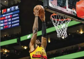  ?? JOHN BAZEMORE/ASSOCIATED PRESS ?? The Hawks’ Onyeka Okongwu has been working on his conditioni­ng since last season, trying “to be in the best shape ever.” His goal is to become a more well-rounded player.