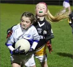  ??  ?? Lucy McCormack (Bree) is tackled by Kitty Roche (Castlebrid­ge).