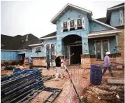  ?? Jerry Baker ?? Trendmaker Homes is at work on a new home along Driftwood Harbor in Lakes at Creekside in Tomball.