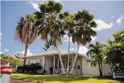  ?? ?? A former U.S. defense contractor and his wife were arrested last year, accused of living at this home in Hawaii for years under identities stolen from dead children.