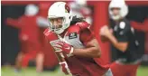  ??  ?? Cardinals wide receiver Larry Fitzgerald runs a route during a practice on Aug. 15.