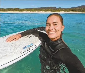  ?? Supplied ?? Surfer and eco warrior Pacha Light off Bicheno on Tasmania’s east coast.