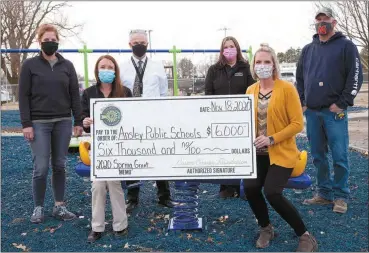  ??  ?? On hand for the presentati­on of a $6,000 Custer County Foundation grant that will go towards the cost of new playground equipment at Ansley Lake Park are, from left, Heidi Beaumont; Lindsay Cook, Custer County Foundation Executive Director; Gordon Goodman, Ansley Schools Superinten­dent; Kiley Miller, Spartan Foundation board member; Alicia Hermsmeyer, Treasurer of the Custer County Foundation; and Brian Beaumont.