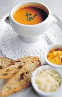  ??  ?? With its luxurious texture and rich flavour, Café Cherrier’s fish soup is a hit.