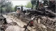  ?? PHOTO PROVIDED BY THE SANTA BARBARA COUNTY FIRE DEPARTMENT ?? This photo shows Montecito Creek flowing alongside debris left over from January mudslides in Montecito, March 21, 2017.