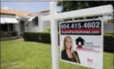  ?? LYNNE SLADKY — THE ASSOCIATED PRESS ?? A house is advertised for sale in Miami. On Thursday, June 21, Freddie Mac reported on the week’s average U.S. mortgage rates.