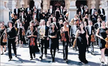  ?? PICTURE: VAL ADAMSON ?? IN TUNE: The KZN Philharmon­ic in front of Durban’s City Hall.